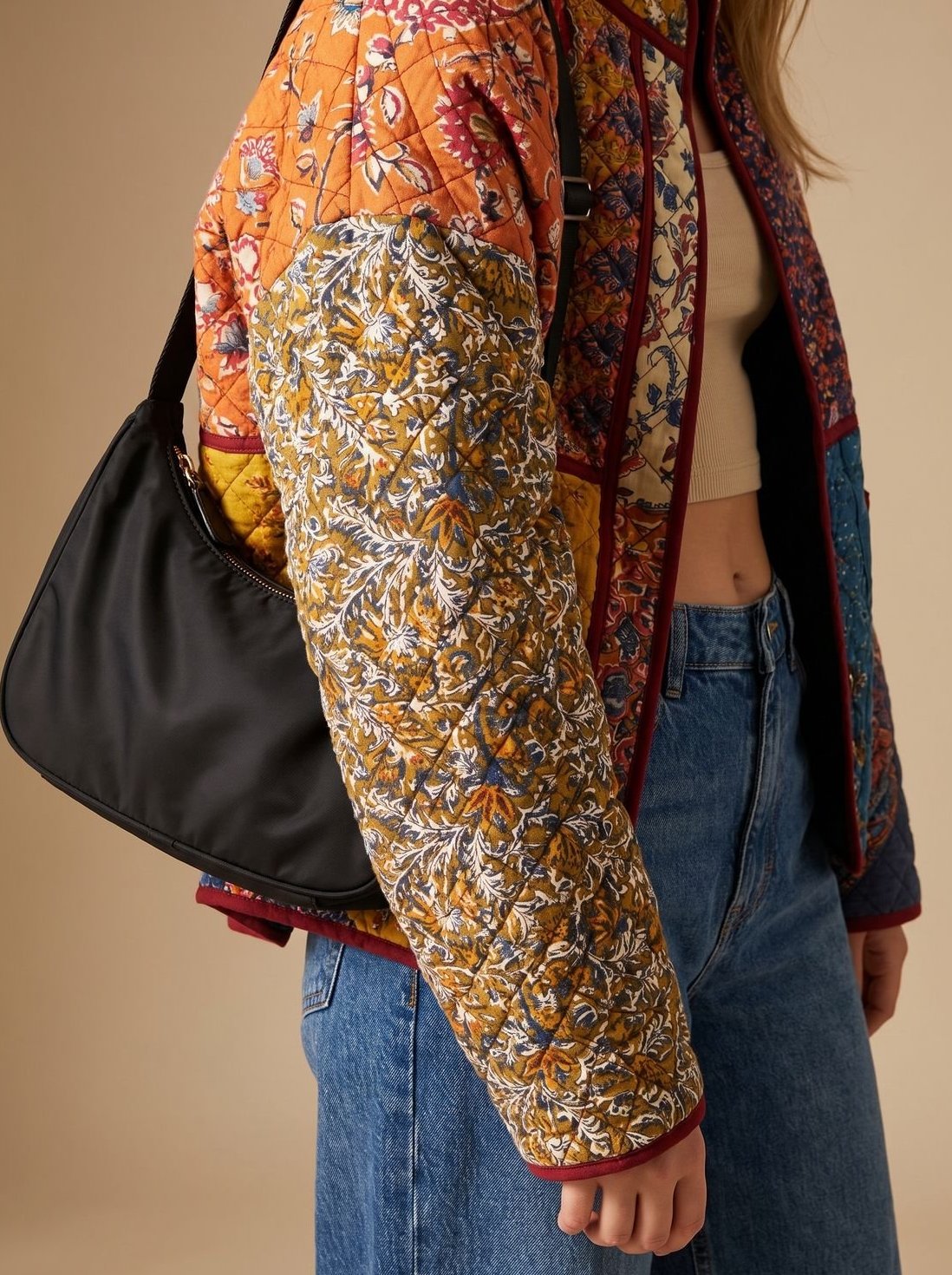 Damen Winterjacke mit Patchworkmuster gesteppt und Stehkragen