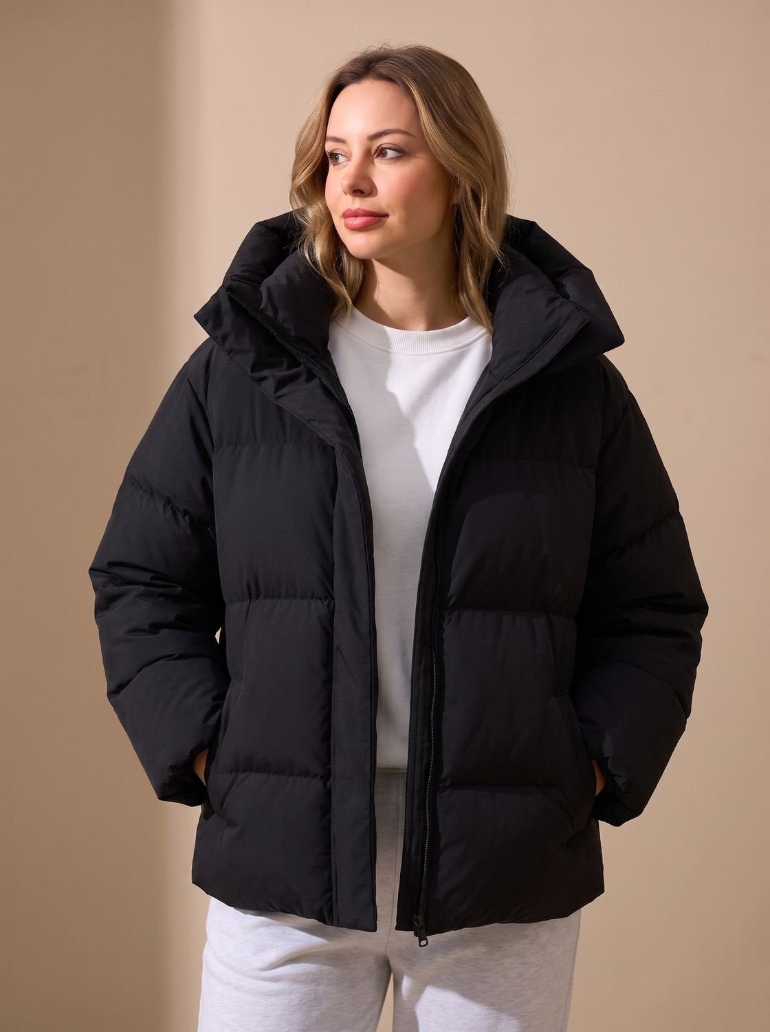 Daunenjacke Damen warm im Oversize-Schnitt mit Kapuze, Winterjacke