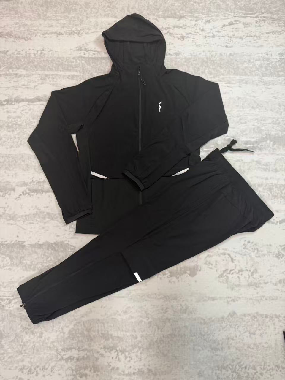 Trainingsanzug mit Kapuzenjacke und langer Hose für Herren